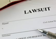 Ex-lottery official in Spain drawn as defendant in jackpot case a lawsuit paper