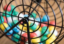 UK prize draw debate resurrected by Minister’s VAT comment A raffle wheel spinning, symbolising prize draws