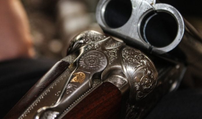 A photo of a double barrell shotgun symbolising the two lottery bills introduced by Texas State Senator Bob Hall