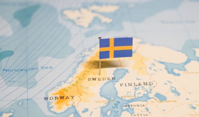 The Swedish flag on a map