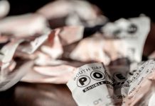 Abbott signs bill abolishing Texas Lottery Commission in September Crumpled up Powerball tickets representing end of TX Lottery Commission