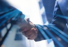Portugal gets an iLottery refresh with Aristocrat Two hands shaking