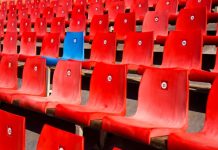 Jackpocket launches ‘The Winnerverse’ to stand out from courier crowd A blue seat stands out among red ones - standing out from the crowd like Jackpocket is doing with its sweepstake product
