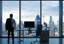 Robeson Reeves takes on leadership of Intralot Silhouette of a CEO standing next to a desk in front of a window overlooking a city skyline