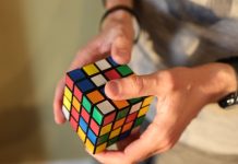 Brightstar signs exclusive contract for Rubik’s cube rights hand holding a Rubik's cube