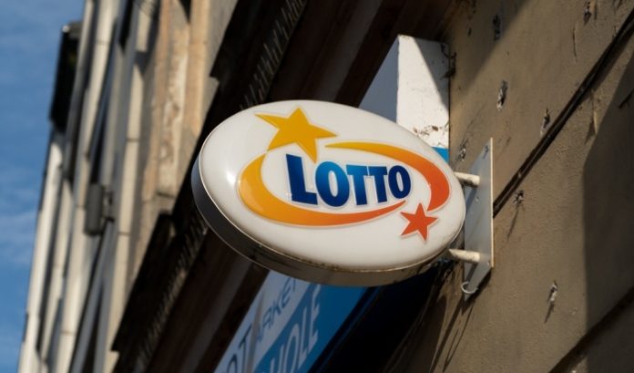 Totalizator Sportowy logo at a store in Krakow, Poland