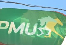 Veikkaus gallops forward with PMU renewal amid Finnish market reform PMU logo at a shop in France