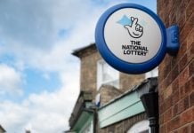 Allwyn ready to reap rewards of major UK lottery revamp Allwyn operated National Lottery sign at a shop