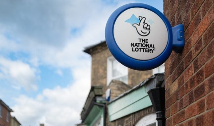 Allwyn operated National Lottery sign at a shop