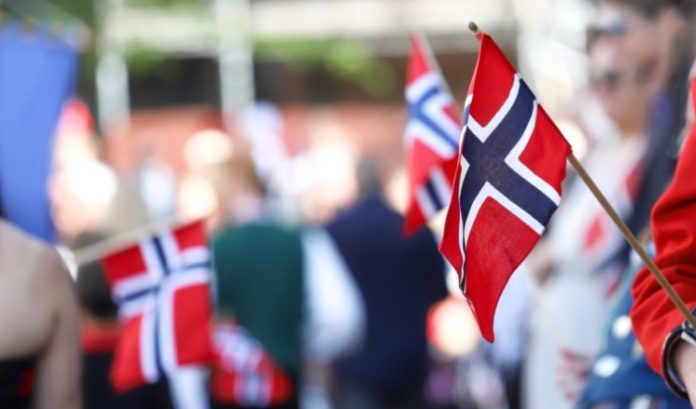 Norwegian flags lined up on a street