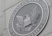 SEC files suit against Lottery.com and former leadership over revenue inflation Symbol of the US SEC, which has filed a legal compalint against Lottery.com, on the side of a government building