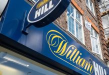 Bally’s Intralot to push way beyond lotteries if evoke buyout goes through A William Hill shop in London, William Hill is owned by evoke, who are in sales talks with Bally's Intralot