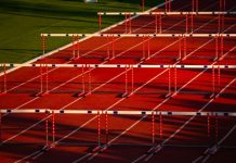 FDJ United’s lottery business hits hurdles despite international growth Running hurdles, symbolising the slowdown in FDJ United's Q1 revenue