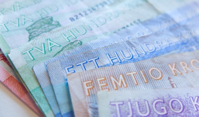 Swedish kroner banknotes, symbolising Svenska Spel's profits