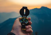 Veikkaus appoints new CFO to navigate new market complexities A hand holding a compass