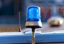 SA authorities seize two houses over alleged lottery corruption A police siren