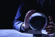 NASPL calls for urgent predictions regulation to protect US lotteries A crystal ball on a desk, symbolising predictions