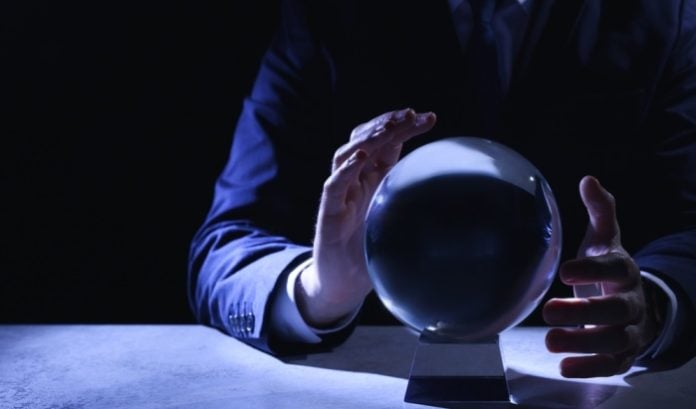 A crystal ball on a desk, symbolising predictions