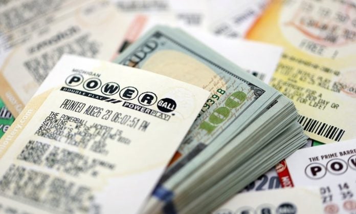 Kyiv,,Ukraine,-,October,22,,2025,Power,Ball,Lottery,Ticket US lottery tickets and dollar bills
