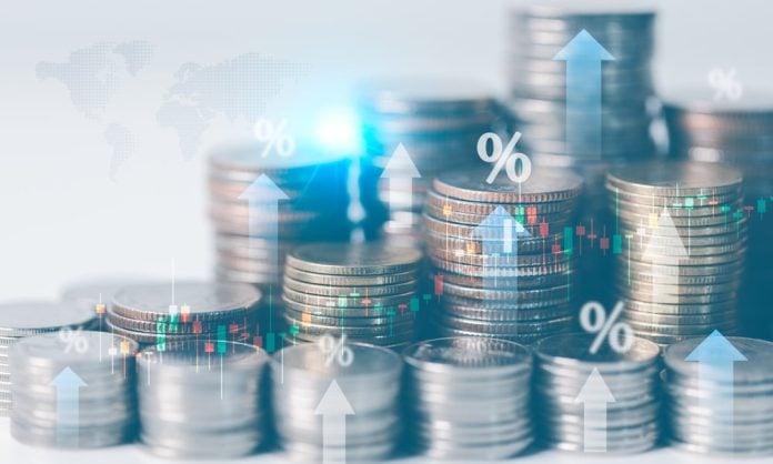 Investing,In,Banking,And,Currency,Drives,Financial,Growth,,Boosting,Economy Euro coins with percentage signs, symbolising Allwyn's revenue growth