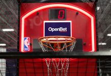 OpenBet steps up lottery ambitions with tech firm takeover OpenBet branding at an SBC event
